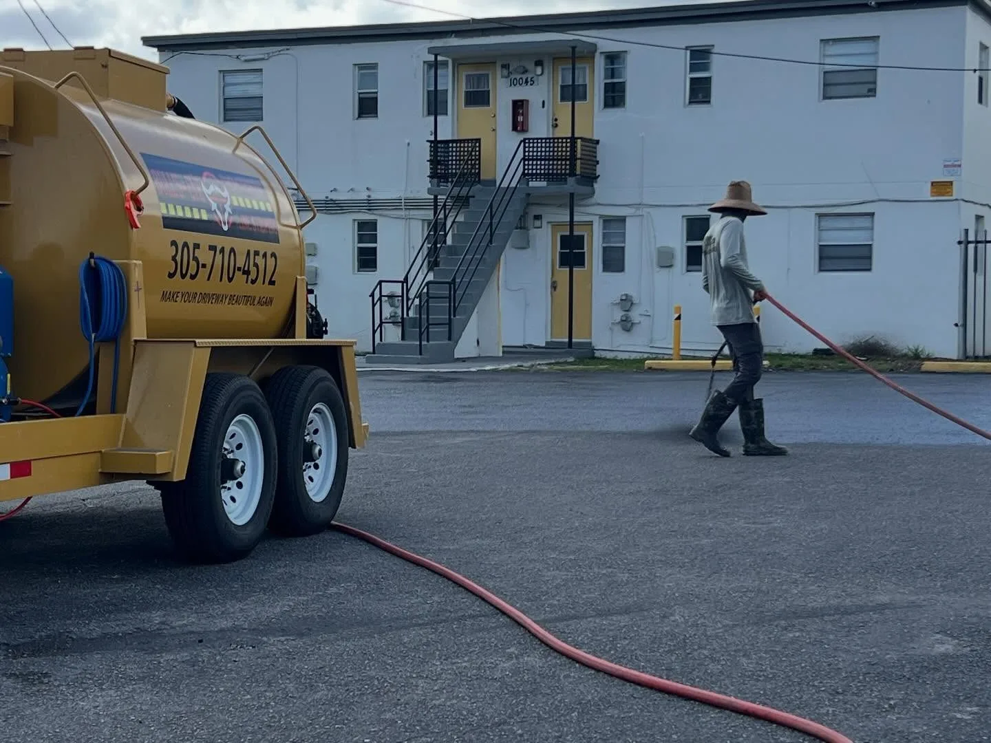 Bull's Eye sealcoating crew at an apartment complex in Cutler Bay, FL